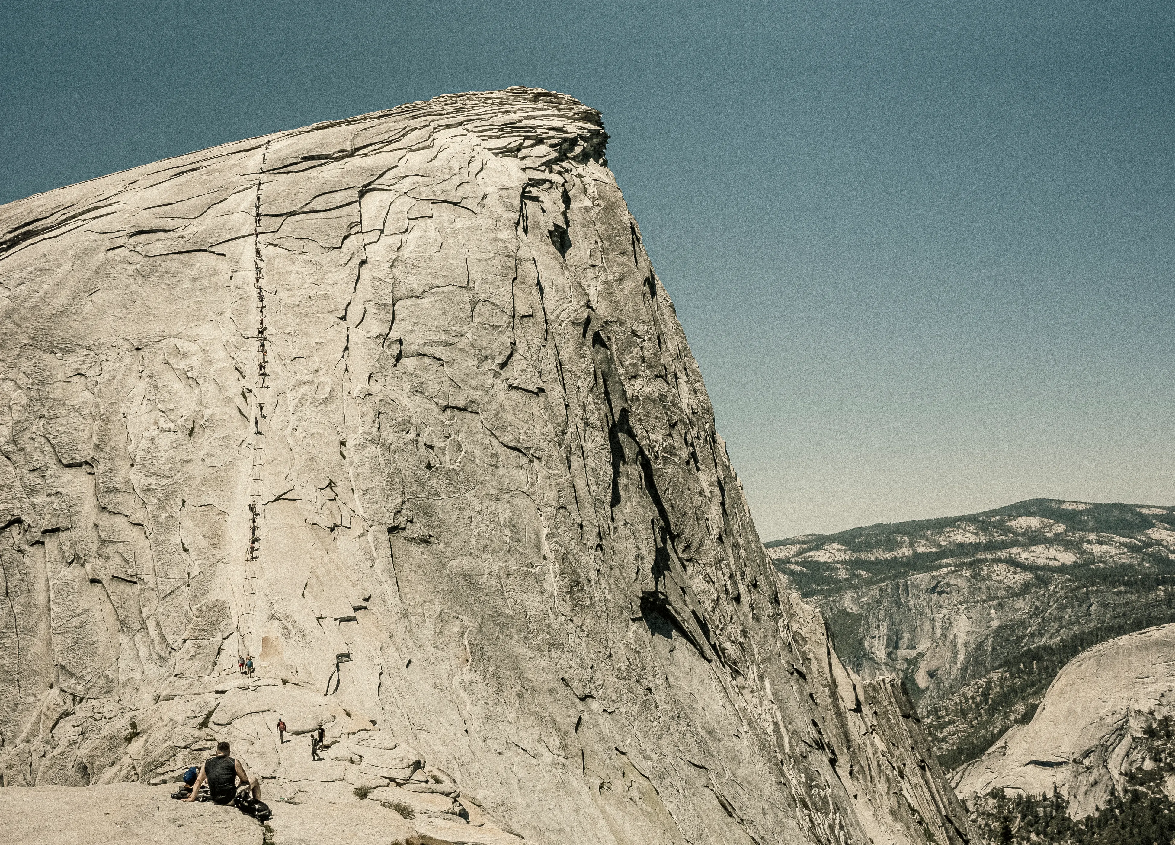 The granite face of Half Dome rising over Yosemite Valley, California.