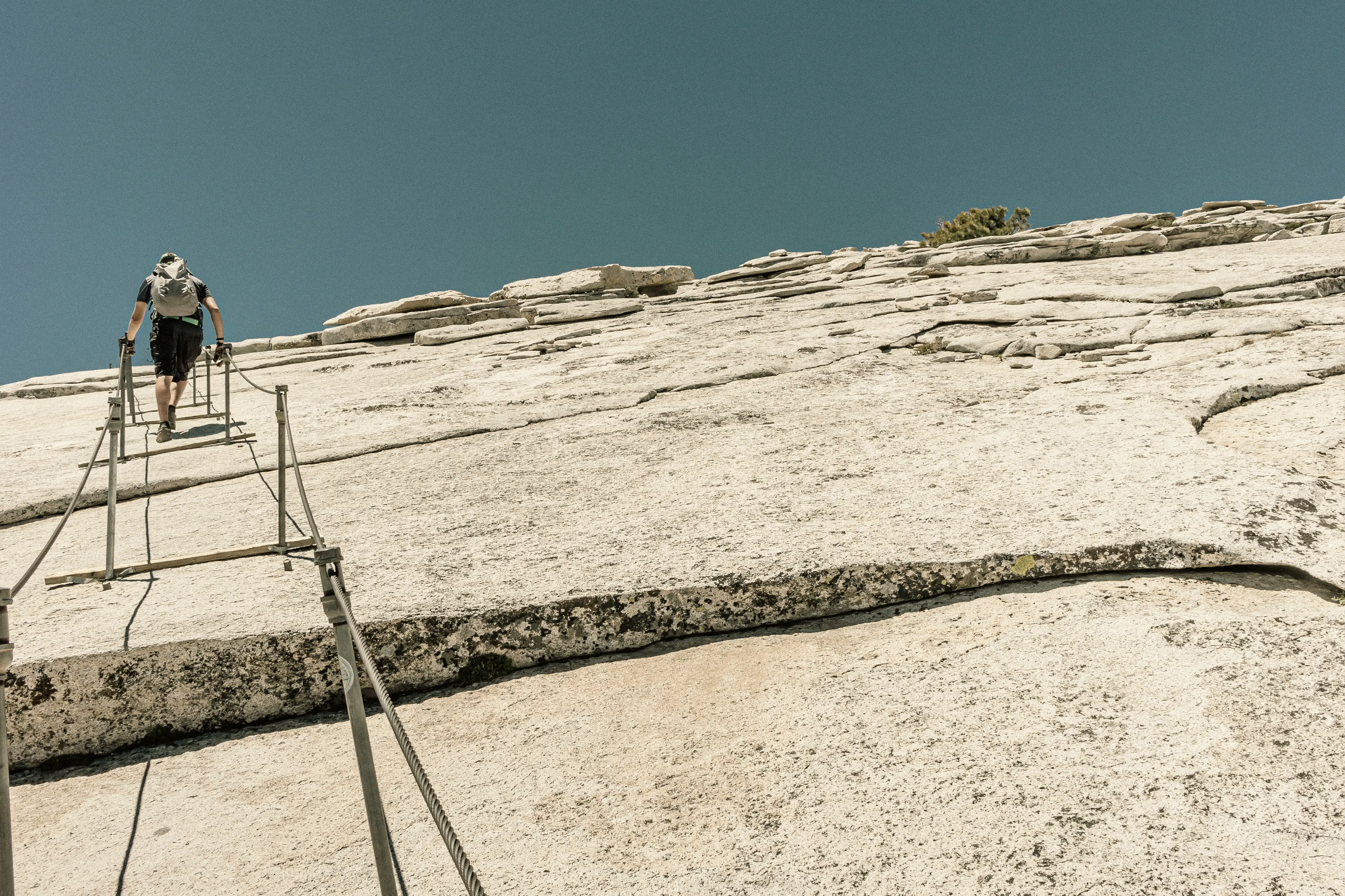 The granite face of Half Dome rising over Yosemite Valley, California.