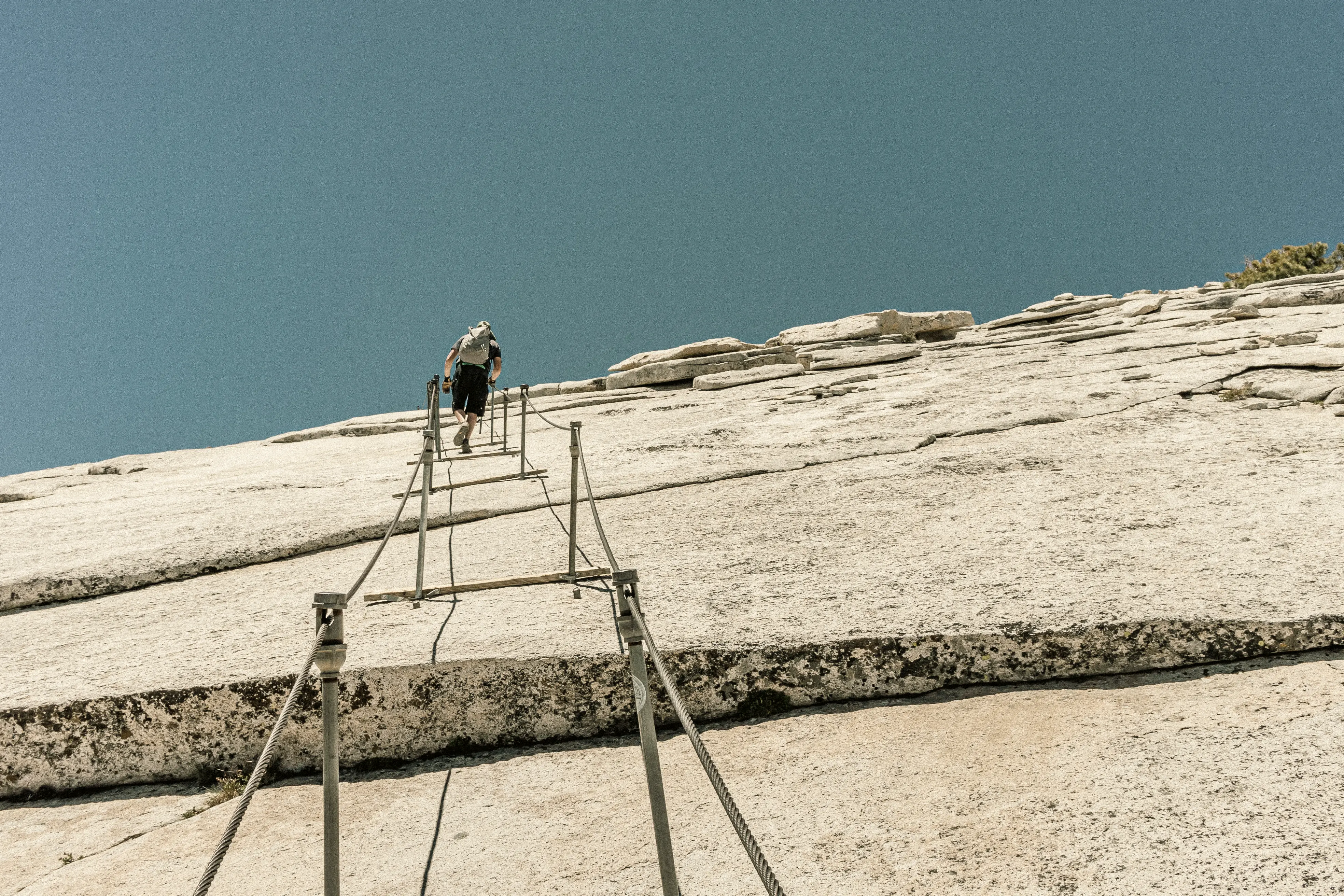 The granite face of Half Dome rising over Yosemite Valley, California.